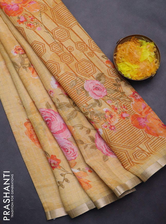 Linen cotton saree yellow with allover floral prints & zari checks and zari woven border