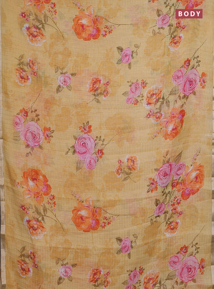 Linen cotton saree yellow with allover floral prints & zari checks and zari woven border