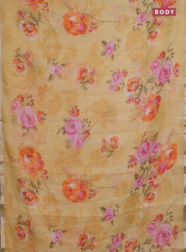 Linen cotton saree yellow with allover floral prints & zari checks and zari woven border