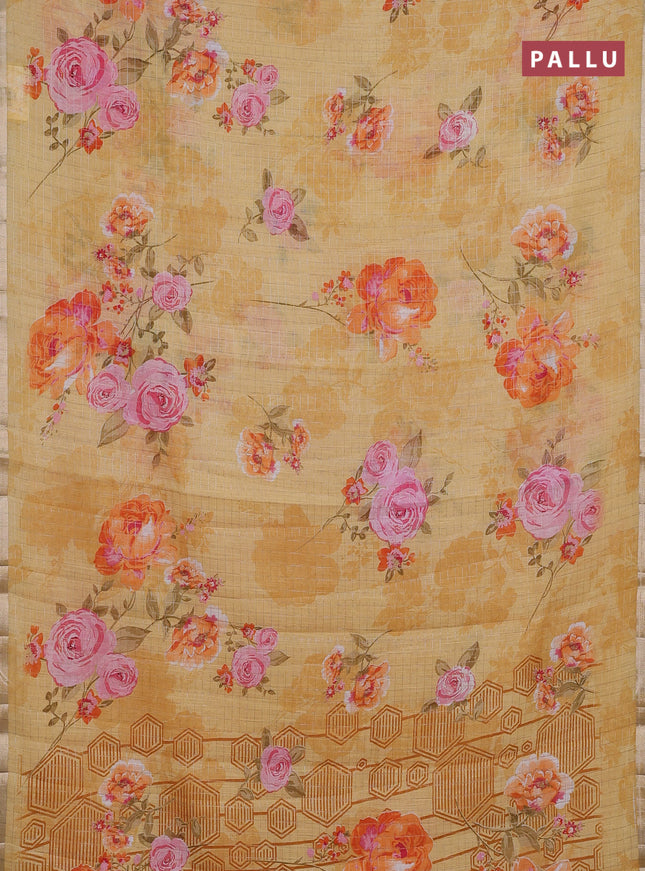 Linen cotton saree yellow with allover floral prints & zari checks and zari woven border