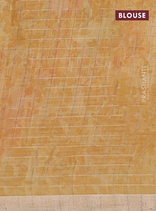 Linen cotton saree yellow with allover floral prints & zari checks and zari woven border