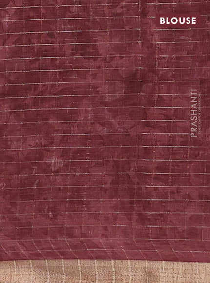 Linen cotton saree pastel maroon with allover floral prints & zari checks and zari woven border