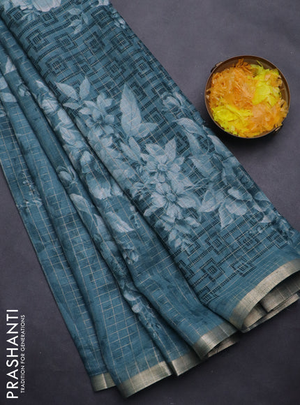 Linen cotton saree peacock blue with allover floral prints & zari checks and zari woven border