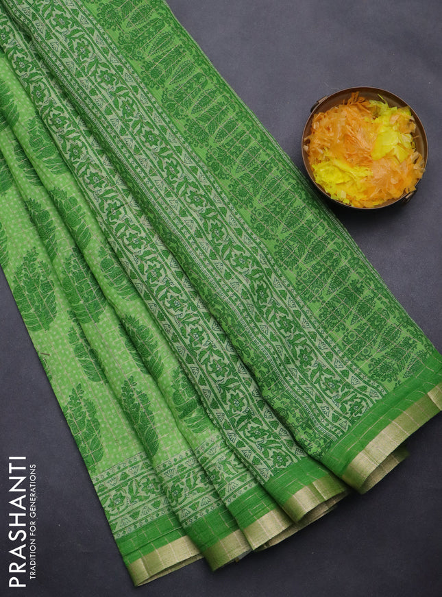 Linen cotton saree green with allover butta prints & zari checks and zari woven border