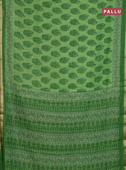 Linen cotton saree green with allover butta prints & zari checks and zari woven border