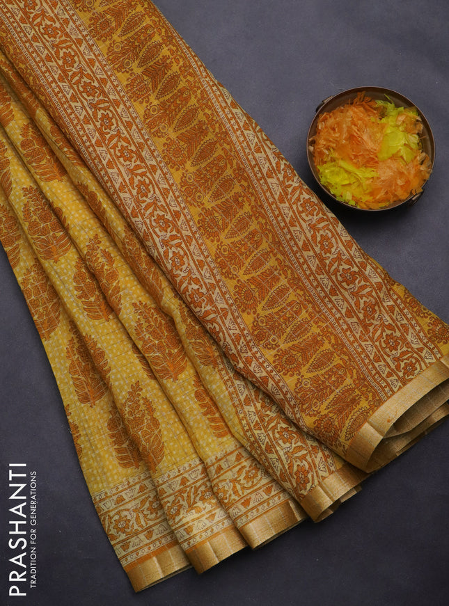 Linen cotton saree yellow with allover butta prints & zari checks and zari woven border