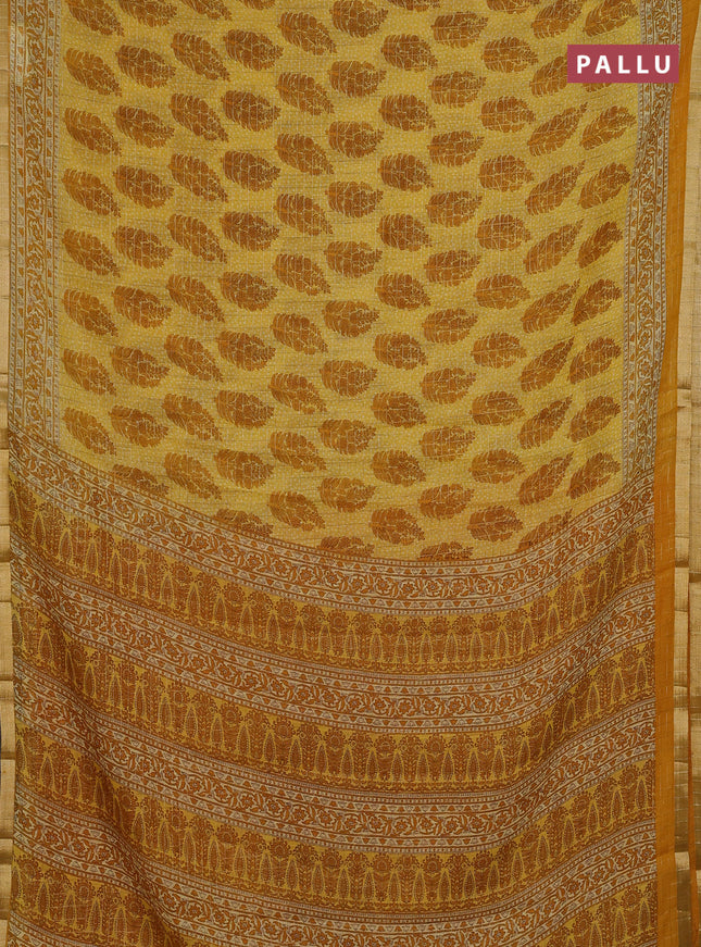 Linen cotton saree yellow with allover butta prints & zari checks and zari woven border