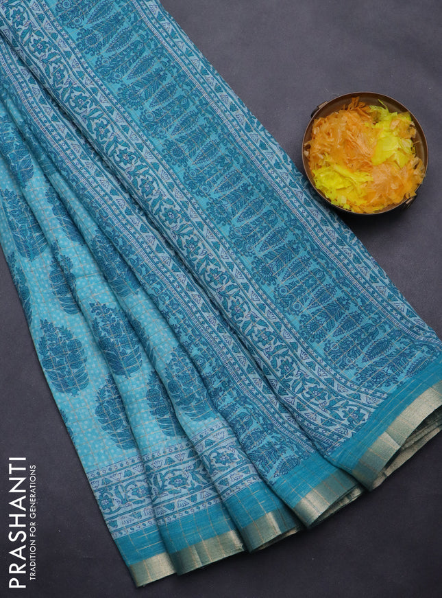 Linen cotton saree teal blue with allover butta prints & zari checks and zari woven border
