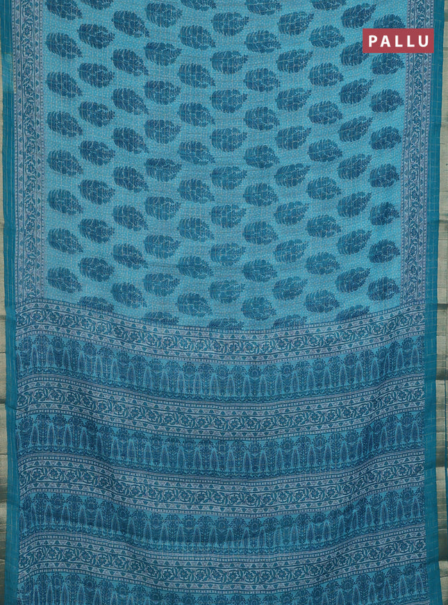 Linen cotton saree teal blue with allover butta prints & zari checks and zari woven border