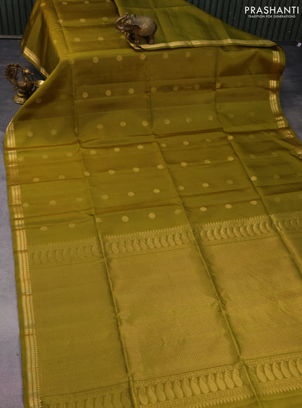 Pure soft silk saree mehendi green with zari woven buttas and zari woven border