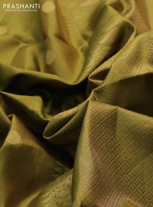 Pure soft silk saree mehendi green with zari woven buttas and zari woven border