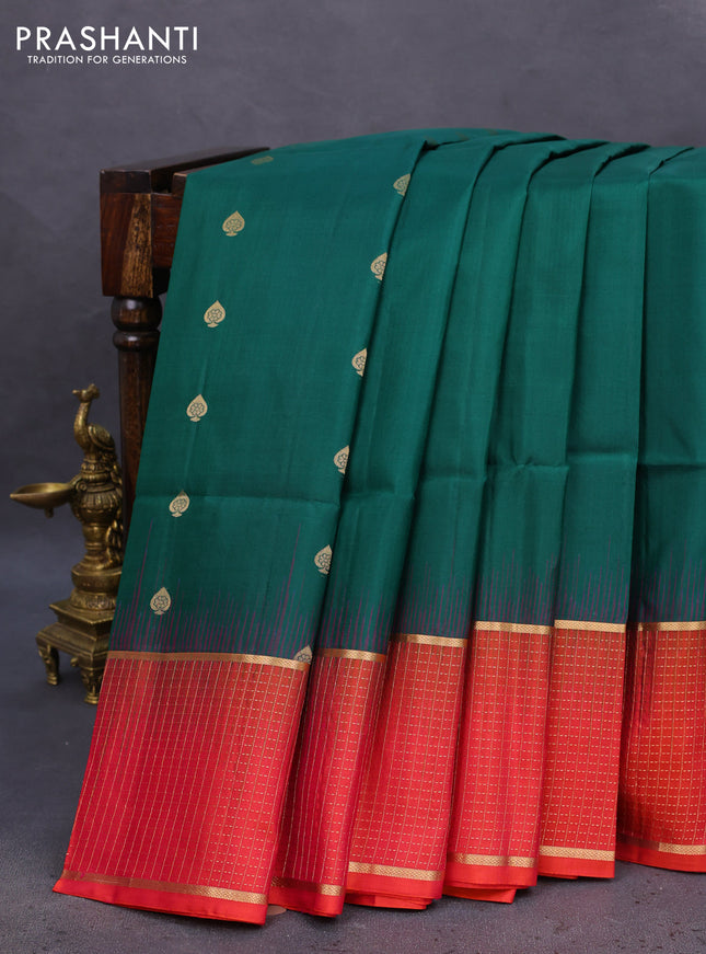 Pure soft silk saree dark green and pinkish orange with zari woven buttas and zari woven checked border