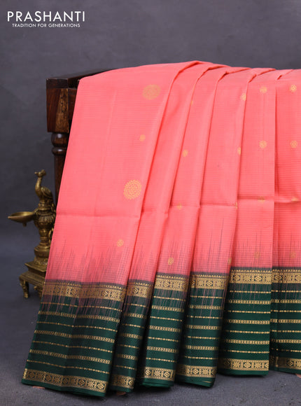 Pure soft silk saree peach pink and dark green with allover zari woven buttas and zari woven border
