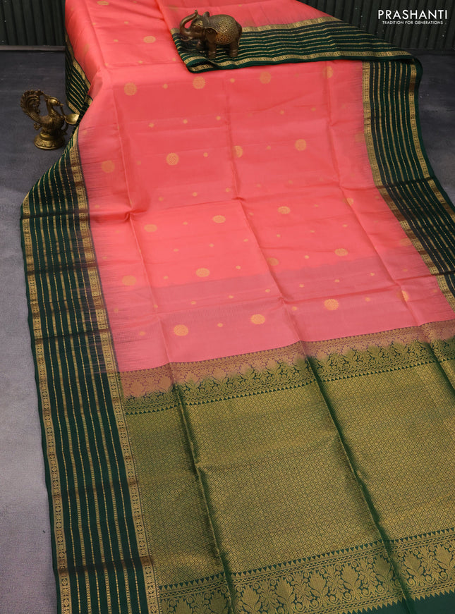 Pure soft silk saree peach pink and dark green with allover zari woven buttas and zari woven border