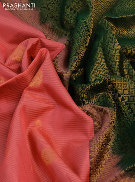 Pure soft silk saree peach pink and dark green with allover zari woven buttas and zari woven border