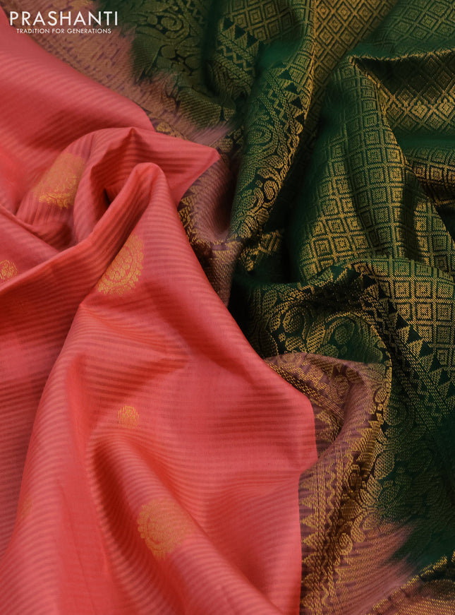 Pure soft silk saree peach pink and dark green with allover zari woven buttas and zari woven border