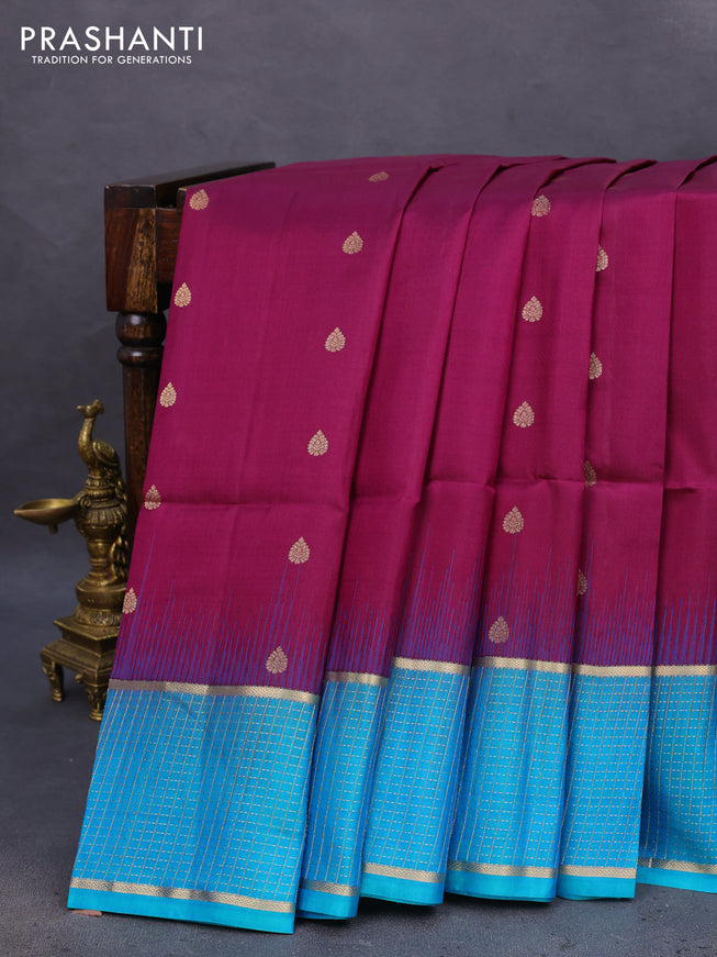 Pure soft silk saree purple and teal blue with allover zari woven buttas and zari woven checked border