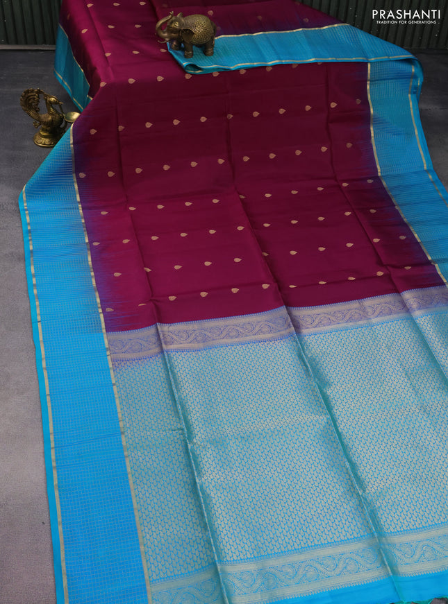 Pure soft silk saree purple and teal blue with allover zari woven buttas and zari woven checked border
