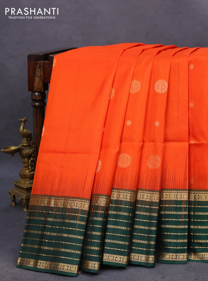 Pure soft silk saree orange and bottle green with allover zari woven buttas and zari woven border