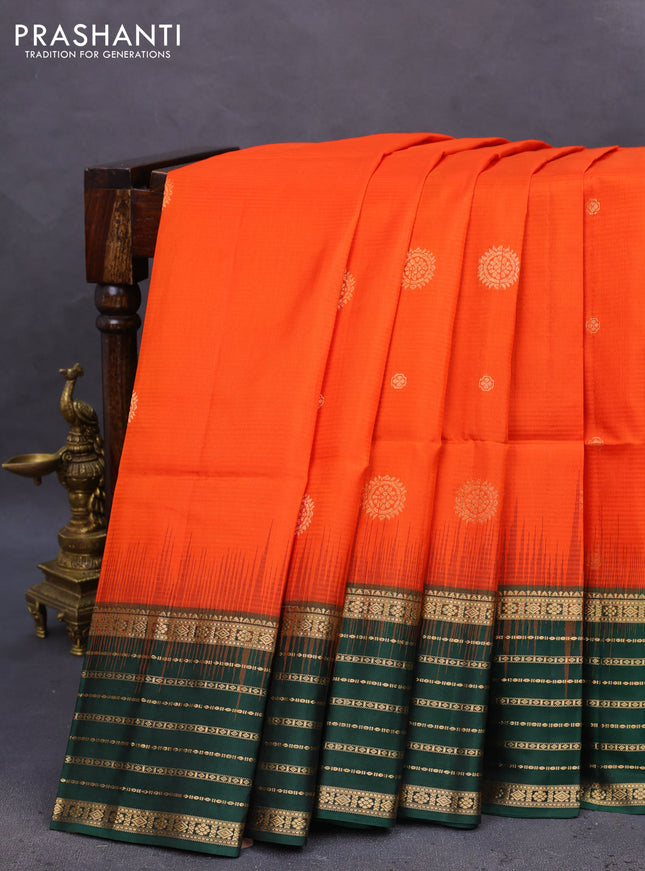 Pure soft silk saree orange and bottle green with allover zari woven buttas and zari woven border