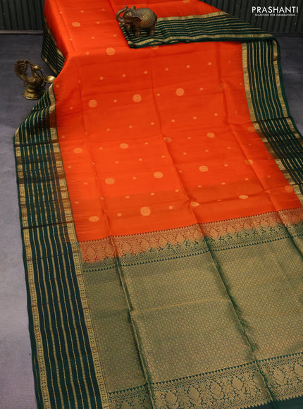 Pure soft silk saree orange and bottle green with allover zari woven buttas and zari woven border