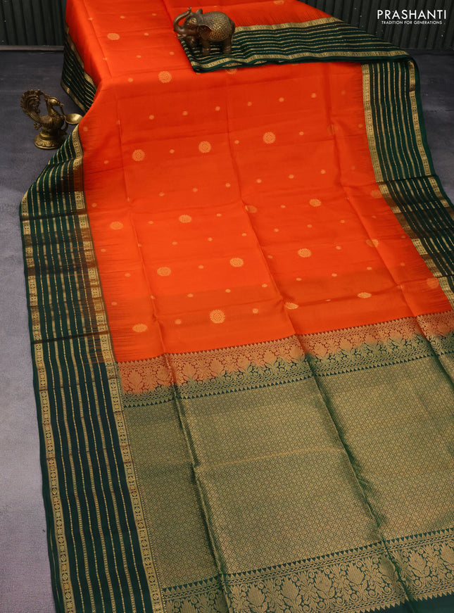 Pure soft silk saree orange and bottle green with allover zari woven buttas and zari woven border