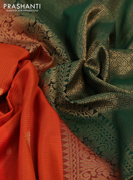 Pure soft silk saree orange and bottle green with allover zari woven buttas and zari woven border