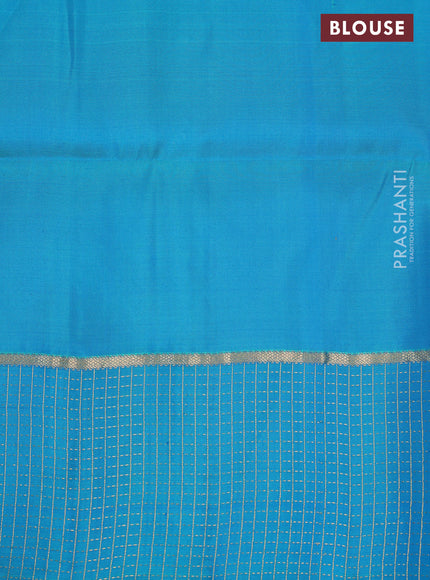 Pure soft silk saree deep purple and teal blue with allover zari woven buttas and zari woven checked border