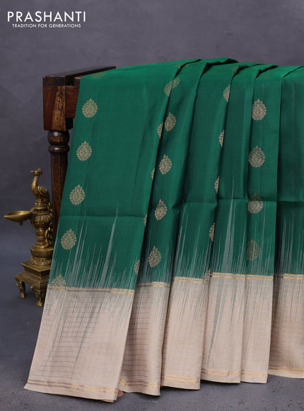 Pure soft silk saree green and beige with allover zari woven buttas and zari woven checked border