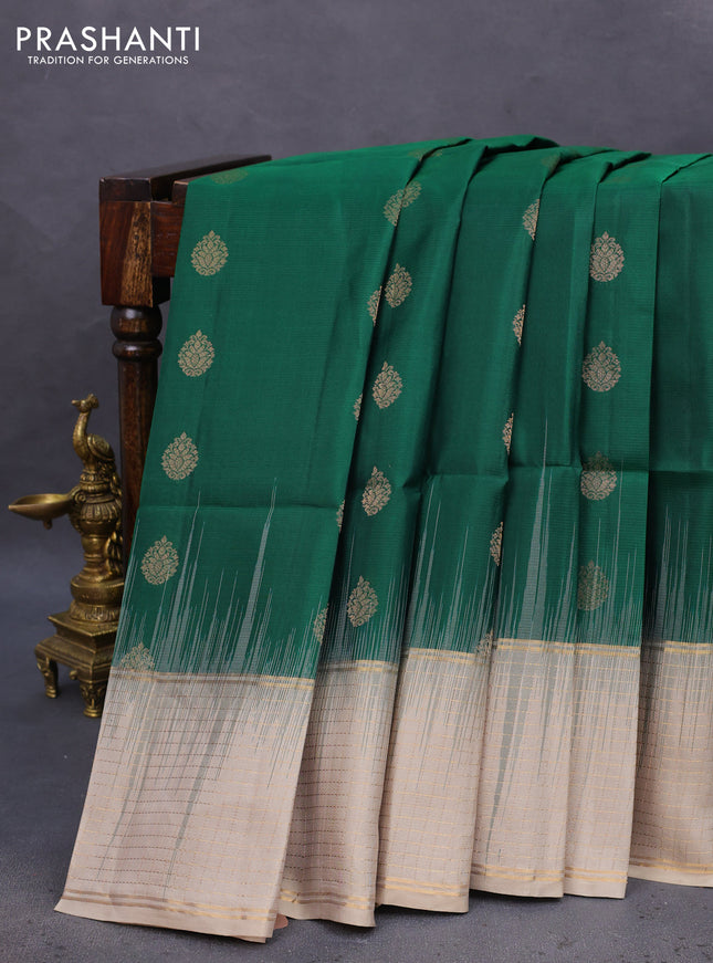 Pure soft silk saree green and beige with allover zari woven buttas and zari woven checked border
