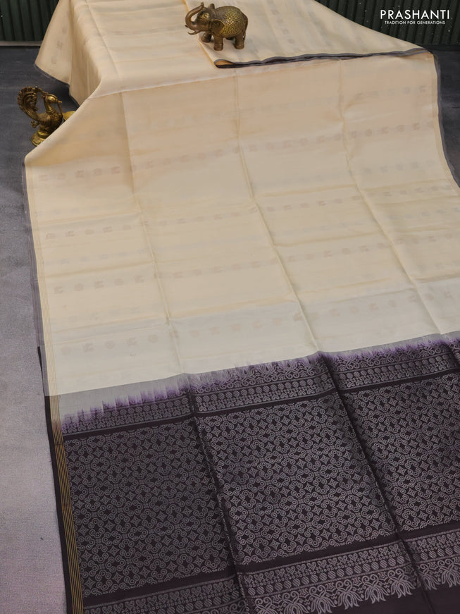 Pure soft silk saree cream and coffee brown with silver & gold zari woven buttas and small zari woven border