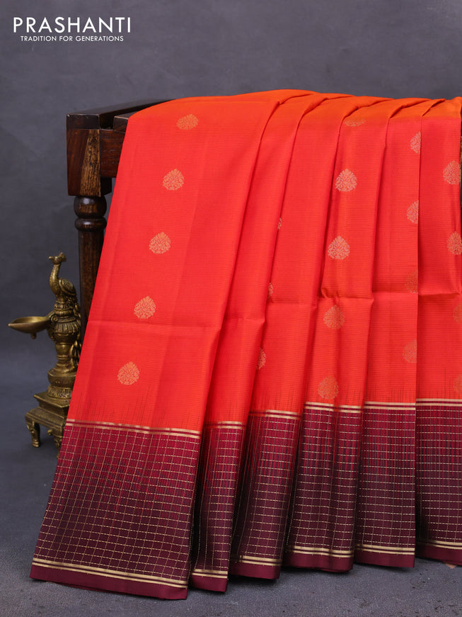 Pure soft silk saree dual shade of pinkish orange and wine shade with zari woven buttas and zari woven checked border