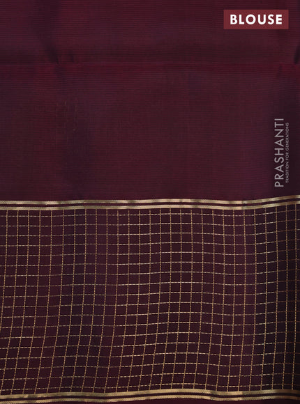 Pure soft silk saree dual shade of pinkish orange and wine shade with zari woven buttas and zari woven checked border