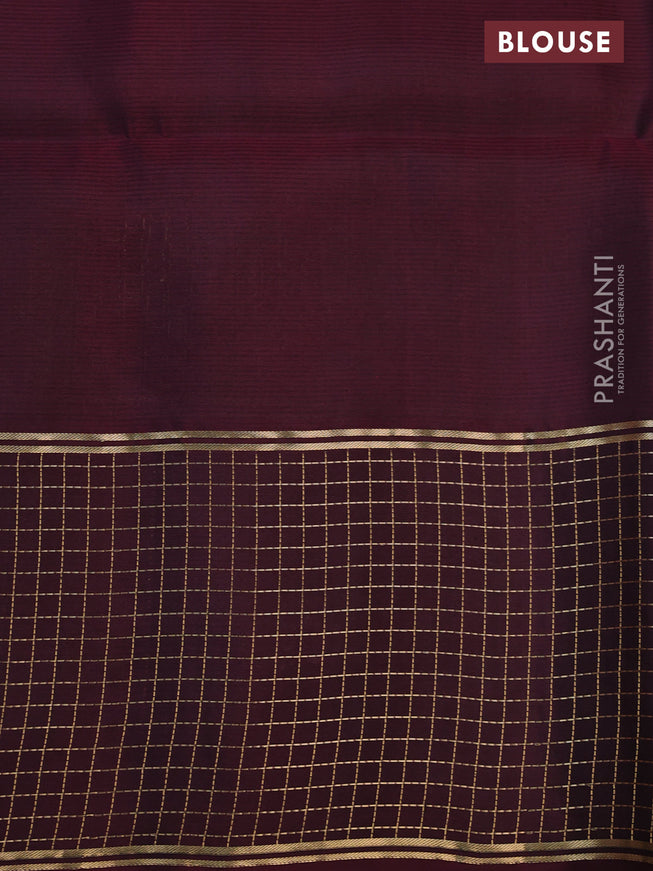 Pure soft silk saree dual shade of pinkish orange and wine shade with zari woven buttas and zari woven checked border