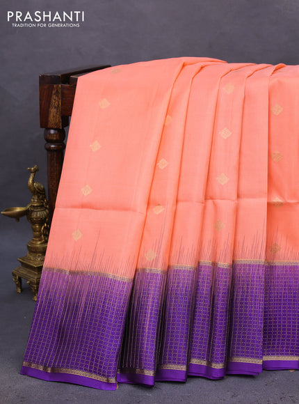 Pure soft silk saree peach shade and violet with zari woven buttas and zari woven checked border