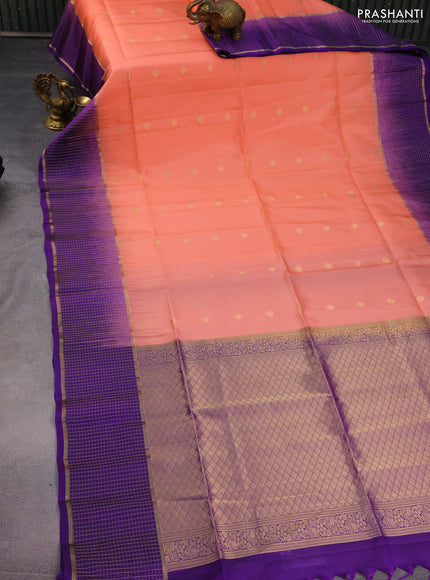 Pure soft silk saree peach shade and violet with zari woven buttas and zari woven checked border