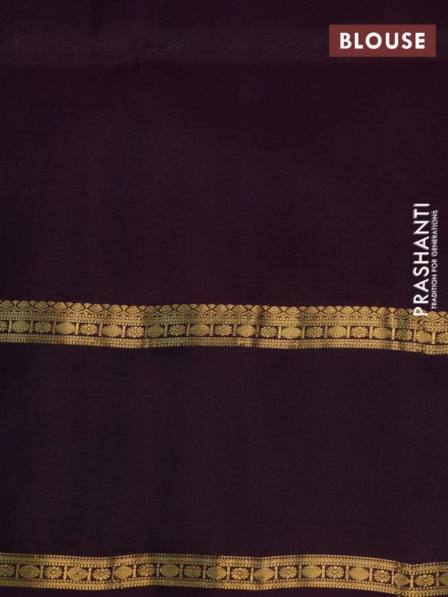 Pure soft silk saree fluorescent green and deep purple with allover zari woven buttas and rettapet zari woven border