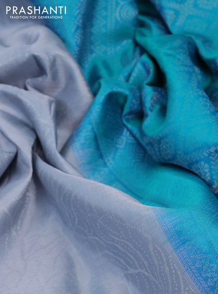 Pure soft silk saree grey and teal bluish green with allover silver woven brocade weaves in borderless style