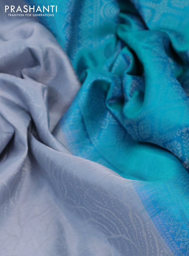 Pure soft silk saree grey and teal bluish green with allover silver woven brocade weaves in borderless style