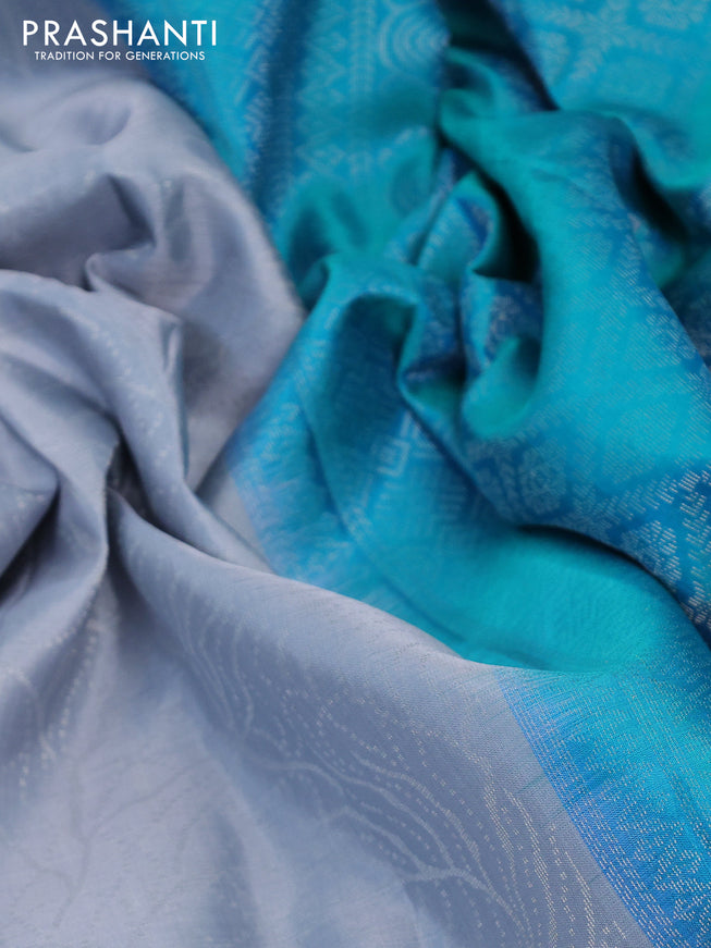 Pure soft silk saree grey and teal bluish green with allover silver woven brocade weaves in borderless style