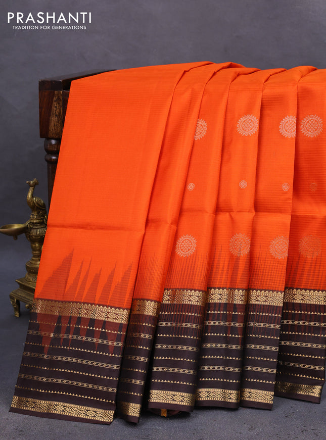 Pure soft silk saree orange and coffee brown with allover zari woven buttas and zari woven border