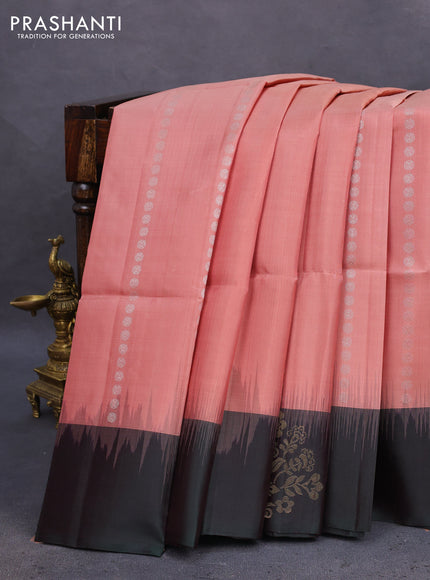 Pure soft silk saree peach shade and bottle green with allover silver zari woven buttas and zari woven buttas border