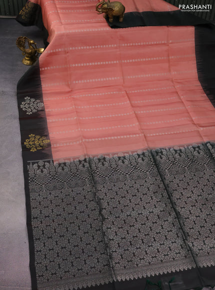 Pure soft silk saree peach shade and bottle green with allover silver zari woven buttas and zari woven buttas border