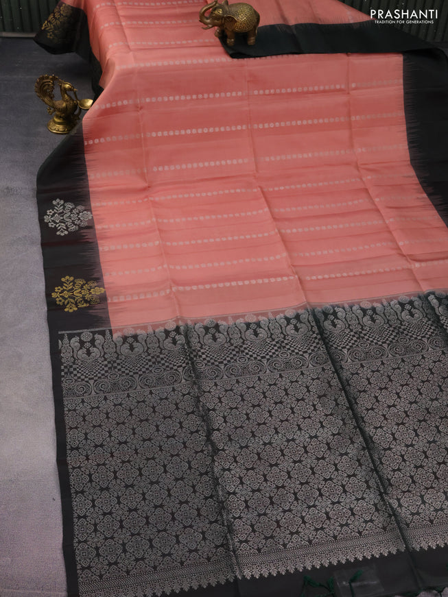 Pure soft silk saree peach shade and bottle green with allover silver zari woven buttas and zari woven buttas border