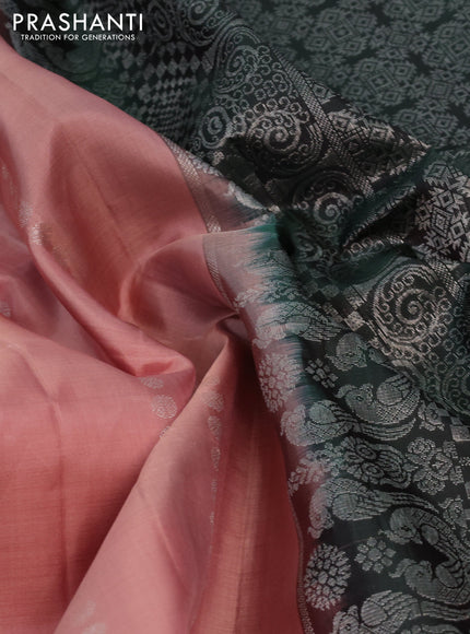 Pure soft silk saree peach shade and bottle green with allover silver zari woven buttas and zari woven buttas border