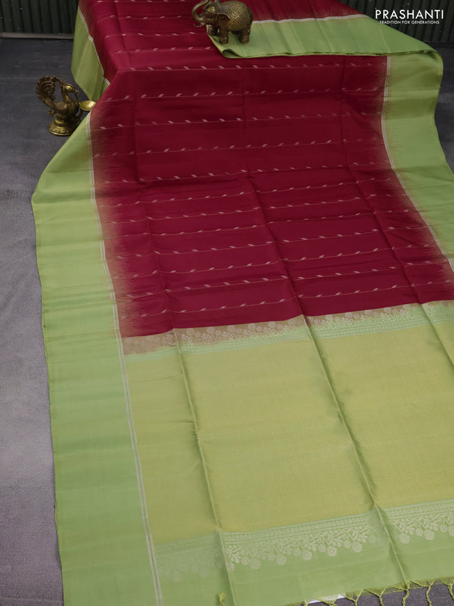 Pure soft silk saree red and pista green with allover zari weaves & buttas and zari woven simple border