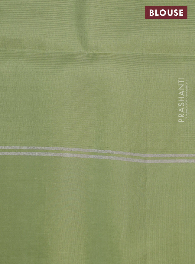 Pure soft silk saree red and pista green with allover zari weaves & buttas and zari woven simple border
