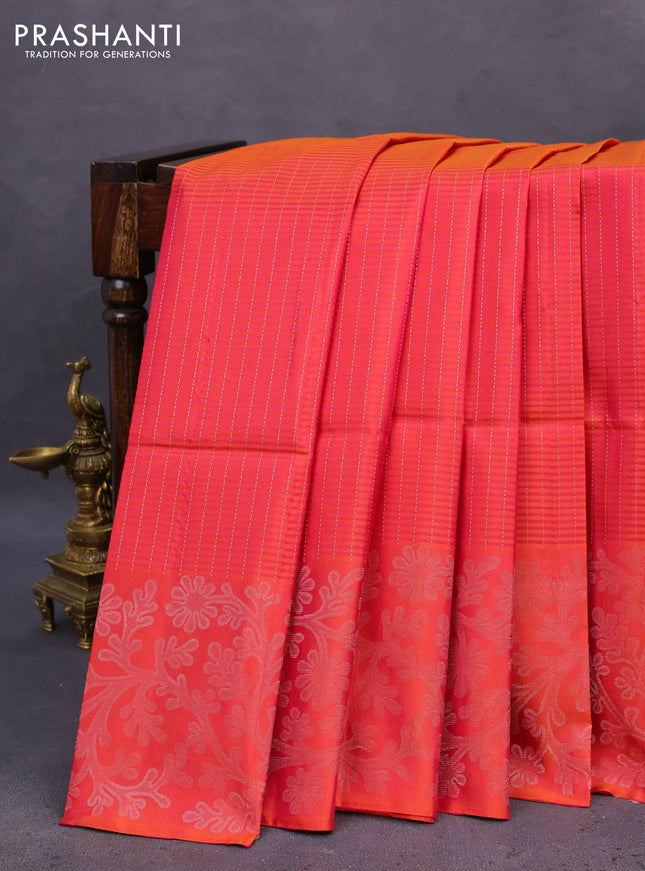 Pure soft silk saree dual shade of pinkish orange with allover silver zari stripe pattern and long silver zari woven border