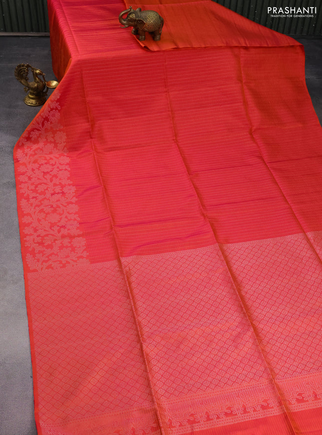 Pure soft silk saree dual shade of pinkish orange with allover silver zari stripe pattern and long silver zari woven border