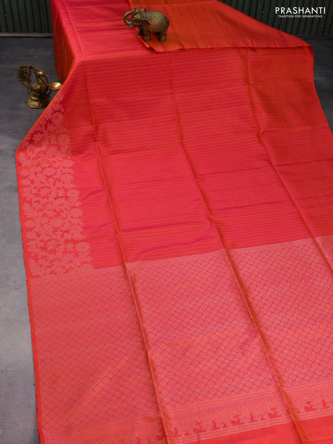 Pure soft silk saree dual shade of pinkish orange with allover silver zari stripe pattern and long silver zari woven border